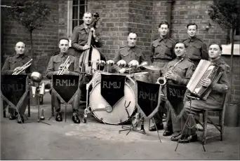  ?? ?? The ‘Royal Militia Island of Jersey’ ensemble in Fenham, Newcastle-upon-tyne in 1943. All are members of the 11th Hampshire Regiment. Christophe­r Redman seated second from the left