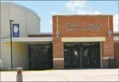  ?? Leslie Hutchison / Hearst Connecticu­t Media ?? Lewis S. Mills High School in Burlington is one of four schools in the district to have armed school security guards in their buildings.