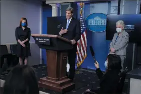  ?? EVAN VUCCI—ASSOCIATED PRESS ?? Special Presidenti­al Envoy for Climate John Kerry speaks during a press briefing at the White House, Wednesday, Jan. 27, 2021, in Washington. National Climate Adviser Gina Mccarthy, right, and Press Secretary Jen Psaki listen.