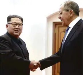  ?? NYT PIC ?? North Korean leader Kim Jong-un (left) meeting Russian Foreign Minister Sergey V. Lavrov in Pyongyang, North Korea, last month. Jong-un has achieved one of the most striking image makeovers in modern diplomacy.