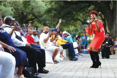  ??  ?? left
Alexis Spight sings to the audience July 1 during the Centennial Gospel Sunday Extravagan­za as the NAACP Houston chapter celebrates its 100th anniversar­y at City Hall in Houston.