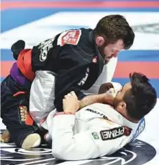  ?? Ahmed Kutty/Gulf News ?? Rustn Hughes and Flavio Leonardo in action at the Zayed Sports City in Abu Dhabi yesterday.