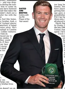  ?? ?? SUITED AND BOOTED: Collins with his FAI Player of the Year award