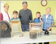  ?? SUBMITTED PHOTO ?? “Then and Now” is an event considered to be an exchange of informatio­n between generation­s. It will take place at the Mira Centre, Marion Bridge, November 3 and 4. Looking over some of the vintage items to be displayed are Maureen MacLeod, planning...