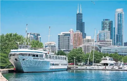  ?? BLOUNT SMALL SHIP ADVENTURES ?? Blount Small Ship Adventures’ Grande Mariner is seen docked at Chicago’s Burnham Harbor. The coronaviru­s pandemic has prompted the cruise line to suspend all 2020 and 2021 voyages in the Great Lakes and beyond.