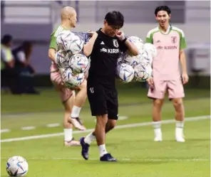  ?? ?? Japan coach Hajime Moriyasu during a training session in Dubai yesterday. (Reuters)