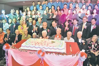  ??  ?? Lau (fifth right, second row) and So on his right joining the elderly at the joyous occasion.