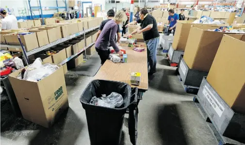  ?? EDMONTON JOURNAL/FILE ?? Edmonton was home to Canada’s first food bank in the 1980s. Now 30 years later food banks are a fixture across the country and Canada is no closer to solving poverty, says policy analyst Janelle Vandergrif­t.