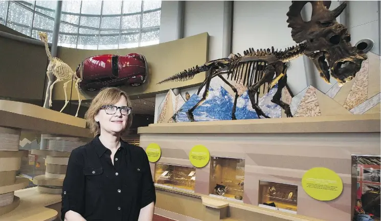  ??  ?? Early childhood learning specialist Nancy Thomas stands surrounded by artifacts in the Children’s Gallery at the RAM. The museum’s designers gave the space a place of prominence.