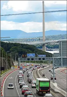  ??  ?? Congestion: Long queues of traffic forming on the approach to the new Queensferr­y Crossing