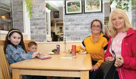  ??  ?? Orliath O’Brien, Aaron Howes, Laoira Howes and Antoinette Curly enjoying being back in Hannah’s Cafe, Wicklow, which re-opened this week.