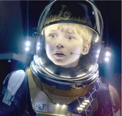  ?? NETFLIX ?? Chicago’s Maxwell Jenkins plays Will Robinson on the new “Lost in Space.”