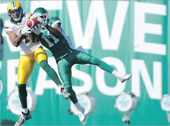  ?? MICHAEL BELL ?? Edmonton receiver Adarius Bowman and Saskatchew­an defender Ed Gainey battle for a ball back on Sept. 18, 2016 — the last time the Riders actually beat a West Division foe.