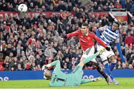  ?? (AFP) ?? Manchester United's Casemiro (C) scores against Reading in their English FA Cup fourth-round match at Old Trafford in Manchester on Saturday