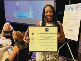  ?? AJC PHOTO ?? On Wednesday, The Atlanta Journal-Constituti­on’s Washington correspond­ent Tia Mitchell was awarded the 2022 David Lynch Award for Regional Reporting.