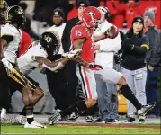  ?? CURTIS COMPTON / CCOMPTON@AJC.COM ?? Lawrence Cager caused a stir when he went down against Missouri, but Kirby Smart said Cager probably could have come back in.