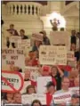  ??  ?? State Sen. David Argall, R-29th Dist., which includes parts of Berks County, addresses a taxpayer rally in the Capitol Rotunda. Argall is the prime sponsor of the Senate bill to eliminate school property taxes.