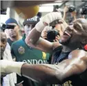  ??  ?? LAUGH Mayweather at open workout and, below, Mcgregor training in desert