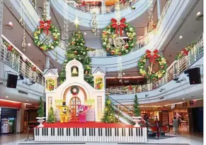  ??  ?? This year, Cheras Leisuremal­l’s Christmas decor has trees decked with gleaming ornaments, intricate musical elements decorating every corner as well as melodious Christmas carols playing in the air.