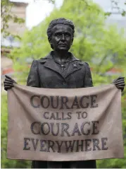  ?? (Hannah McKay/Reuters) ?? THE STATUE of suffragist Millicent Fawcett is seen in Parliament Square in London yesterday.