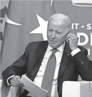  ?? SUSAN WALSH/AP ?? President Joe Biden listens Wednesday while meeting with Turkey’s President Recep Tayyip Erdogan during the NATO summit in Madrid.