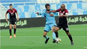  ?? Supplied photo ?? Al Wahda’s seasoned star Ismail Matar vies with a Hatta player during their AGL tie. —