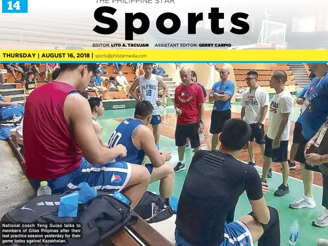  ??  ?? National coach Yeng Guiao talks to members of Gilas Pilipinas after their last practice session yesterday for their game today against Kazakhstan.