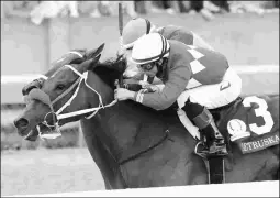  ?? COADY PHOTOGRAPH­Y ?? Letruska (No. 3) edges Monomoy Girl by a nose to win the Grade 1 Apple Blossom Handicap on Saturday at Oaklawn.