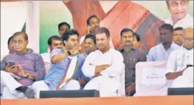  ?? HT PHOTO ?? Congress president Rahul Gandhi with Madhya Pradesh campaign committee head Jyotiradit­ya Scindia during a public meeting in Jaura in Morena district on Tuesday.