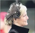  ?? PA. ?? From left: Autumn and Peter Phillips with the Princess Royal; Zara Phillips and husband Mike Tindall; Princess Eugenie and the Countess of Wessex wearing a fascinatin­g fascinator.