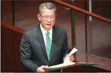  ?? CALVIN NG / CHINA DAILY ?? Financial Secretary Paul Chan Mo-po on Wednesday announces measures to create a citywide green ecosystem in his budget speech.