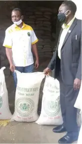  ??  ?? The State Chairman of Poultry Associatio­n, Mr. Godwin Egbegbe; and the Programme Manager/ CEO, Dr. Olalekan Sheteolu at the presentati­on of the 450 tons of maize palliative from the federal government to poultry farmers in Lagos State