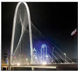  ?? AP/TONY GUTIERREZ ?? The Margaret Hunt Hill Bridge is one of the newer attraction­s in Dallas and spans the Trinity River.