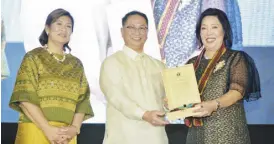  ?? ?? Wilcon Depot SEVP-COO Rosemarie Bosch - Ong received the University of the Philippine­s Gawad Oblation Award on Jan. 17, 2023, held at Ang Bahay ng Alumni, UP Diliman. The University president gives the award to UP’s alumni and supporters who have rendered “extraordin­ary service with or in the name of UP. Photo shows (L-R) vice-president for public affairs University of the Philippine­s System Prof. Elena E. Pernia, Ph.D., president of University of the Philippine­s System Prof. Danilo Concepcion and Wilcon Depot SEVP-COO Rosemarie Bosch - Ong.
