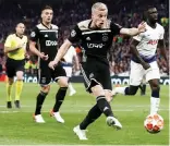  ?? — AFP photo ?? Ajax’s midfielder Donny van de Beek (centre) shoots to score the opening goal of the UEFA Champions League semi-final first leg match against To enham Hotspur at the To enham Hotspur Stadium in north London.