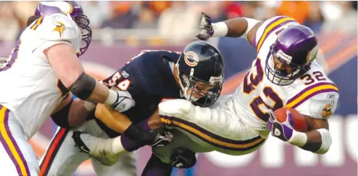  ?? AP ?? Brian Urlacher, who will be inducted into the Hall of Fame on Saturday, led the Bears in a pregame huddle and spoke to the team in the locker room before the game.