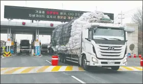  ?? AP/AHN YOUNG-JOON ?? A South Korean cargo truck returning from North Korea’s joint Kaesong Industrial Complex passes the customs, immigratio­n and quarantine office Thursday near the border village of Panmunjom in Paju, South Korea.