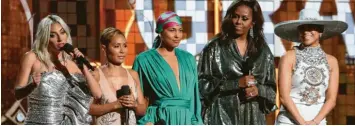  ?? Foto: Matt Sayles, Invision, dpa ?? Geballte Frauenpowe­r: Lady Gaga, Jada Pinkett Smith, Alicia Keys, Ex-first-lady Michelle Obama und Jennifer Lopez (von links) im Staples Center in Los Angeles während der 61. Grammy Awards.