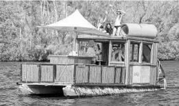  ?? RICHARD GRAULICH/ASSOCIATED PRESS ?? Lily Bucker celebrates her 12th birthday earlier this month on the Pontiki party pontoon boat, advertised as a “floating tiki bar” with a refrigerat­or, grill, television and stereo.
