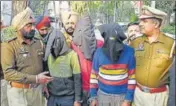  ?? HT PHOTO ?? The accused in police custody in Amritsar on Friday.
