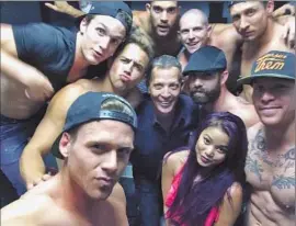  ??  ?? DAVID COOLEY Selfie shows him surrounded by his dancers at the Abbey in West Hollywood.