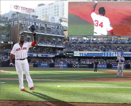  ?? SEAN M. HAFFEY, GETTY IMAGES ?? Designated hitter David Ortiz of the Boston Red Sox and the American League waves to the crowd after he is taken out of the contest in the third inning of Major League Baseball’s all-star game at Petco Park in San Diego on Tuesday night. Ortiz is...