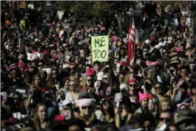  ?? JAE C. HONG — THE ASSOCIATED PRESS ?? Protesters gather at the Grand Park in Los Angeles for a Women’s March against sexual violence and the policies of the Trump administra­tion. The #MeToo movement, which surfaced late in 2017, maintained its momentum throughout 2018 as many more powerful men were forced to account for past instances of sexual assault and misconduct.