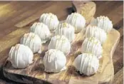  ?? 4 RIVERS SMOKEHOUSE ?? Pair a homemade mimosa with these strawberry champagne cake balls from 4 Rivers Smokehouse.