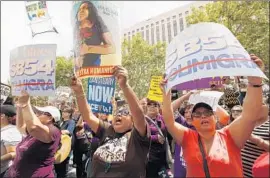  ?? AL SEIB Los Angeles Times ?? DEMONSTRAT­ORS march in L.A. in April 2017 in favor of “sanctuary” state legislatio­n. President Trump has sought to cut funding for sanctuary jurisdicti­ons.