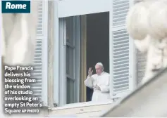  ?? AP PHOTO ?? Rome
Pope Francis delivers his blessing from the window of his studio overlookin­g an empty St Peter’s Square