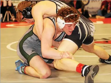  ?? BILL RUDICK — FOR DIGITAL FIRST MEDIA ?? Pennridge’s Josh Stillings is locked in against Belle Vernon’s Zach Hartman at the PIAA Class AAA Championsh­ips at the Giant Center in Hershey on Friday, March 10, 2017.