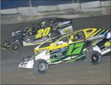  ?? PHOTO COURTESY MARK BROWN/RYAN KARABIN KUSTOM KEEPSAKES ?? Modified action during the June 9 J.C. Flach Memorial at Lebanon Valley Speedway betweem Rob Pitcher (17) and Brett Hearn (20).