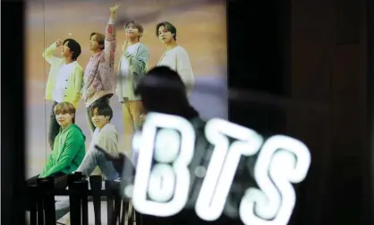  ?? Photograph: YONHAP/EPA ?? Big Hit Entertainm­ent, the company behind BTS, is now worth almost 10 trillion won ($US8.5bn) following its stock market IPO