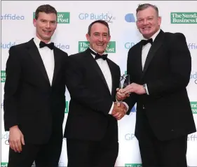  ??  ?? Winner of the Rural Practice of the Year, Dr Michael Kennedy from Buttevant Medical Centre, is presented with his award by Joe Newell, CEO, GPBuddy.ie and David Corkery, Business Developmen­t Manager, Affidea Ireland.